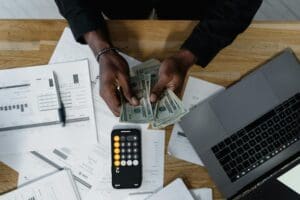 Accountant counting money for a client  